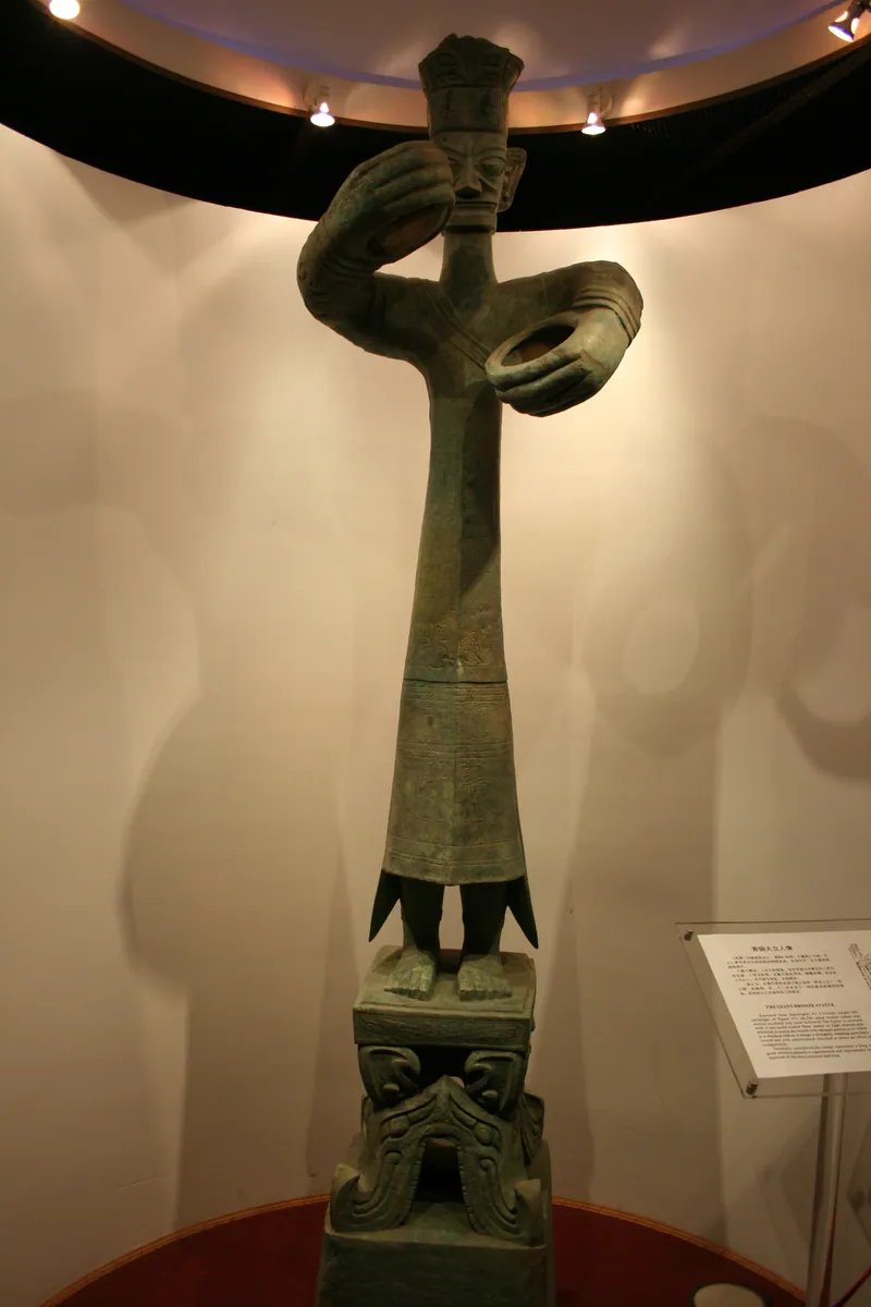 The 1986 bronzes from Pits 1 and 2 (standing figure, heads, masks and trees)