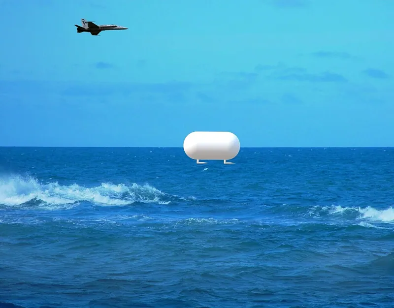 USS Nimitz 2004 "Tic Tac" UFO, shown hovering over a sea surface disturbance while approached by an F/A-18 hornet.