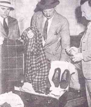 Brown suitcase and contents: picture