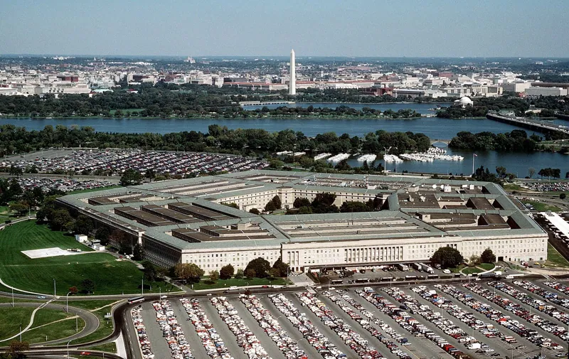 The Pentagon , looking northeast with the Potomac River and Washington Monument in the distance.